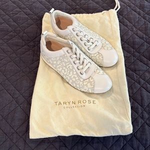 White cheetah print shinny taryn rose sneakers.